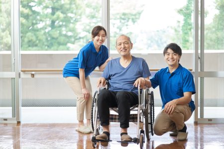 Asian elderly and male and female caregivers